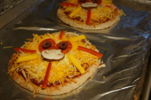 Lion Pita Pizzas - healthy and cute dinner or snack for the kids from Mango.org | StylishSpoon.com