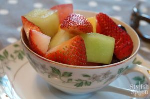 pink princess party tea cups fruit salad