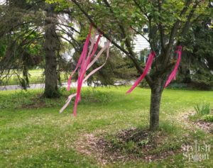 pink princess birthday party - pink streamers on a tree