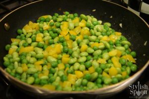 Sauteed peas, edamame and yellow bell peppers - spring vegetable mix