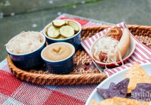 4th of july hot dogs with all the fixings and condiments