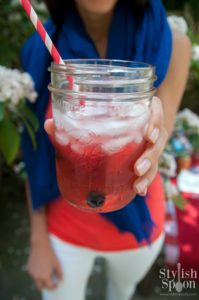 red and blue sangria in ball jar