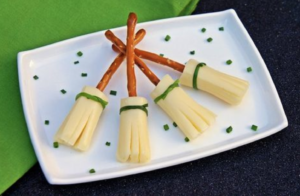 Healthy kids halloween snacks witch broomsticks cheese and pretzel
