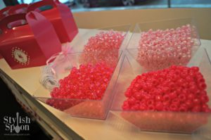 I put 4 different types of pink beads in clear plastic bowls for the girls to use to make their necklaces and/or bracelets. Surprisingly none of the girls spilled the beads, but one of the nail technicians ended up knocking an entire bowl down on the floor towards the end of the party (she was making a necklace for the birthday girl when she finished doing nails - so sweet!). We swept them up pretty quickly.