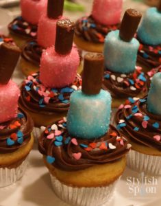 I made chocolate and vanilla cupcakes and used chocolate and vanilla frostings to offer a variety. I also added Valentine's day sprinkles that I found in the dollar bin at Target since it was a week before Valentine's day and the colors went with our theme.
